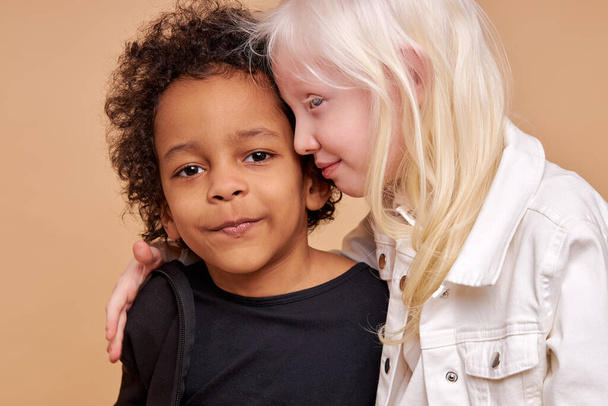 friendly children, tender black and albino kids - Foto, immagini