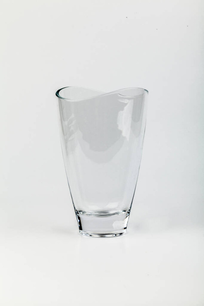 empty big glass vase on white background - Foto, afbeelding