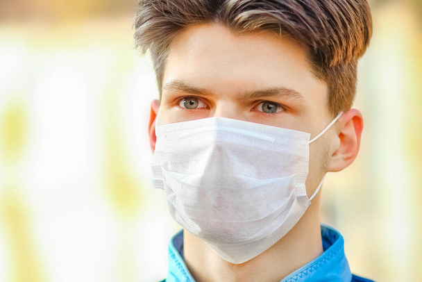 masked man from coronavirus and air. Protection against PM 2.5 air polluted from the virus in Europe and Asia - Fotó, kép