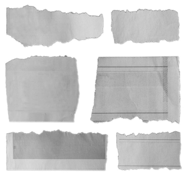 Seis pedaços de papel rasgado sobre fundo liso
  - Foto, Imagem