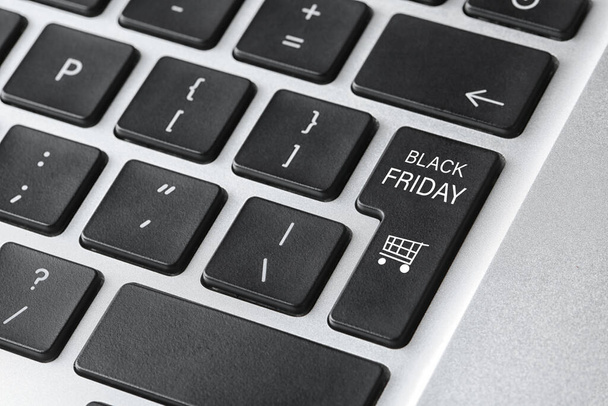 Laptop keyboard with Black Friday button, closeup. Online shopping  - Zdjęcie, obraz