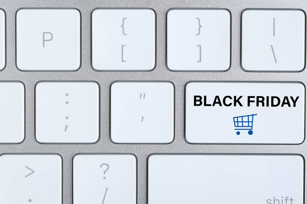 Computer keyboard with Black Friday button, closeup. Online shopping  - Foto, Bild