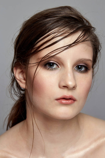 Professional model with delicate make-up and wet hair effect. - Fotografie, Obrázek