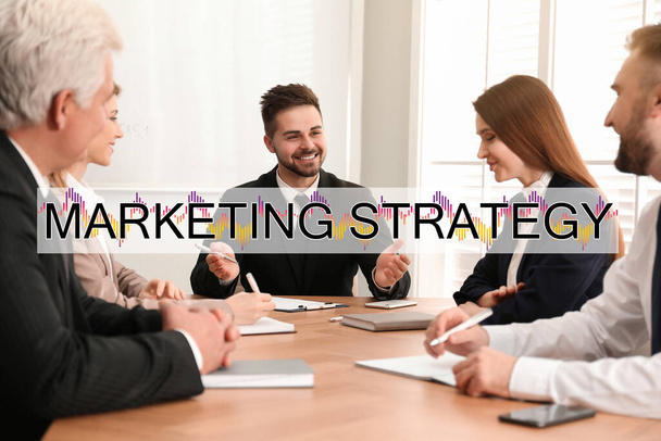 Digital marketing strategy. Team of professionals working together at table in office - Fotoğraf, Görsel