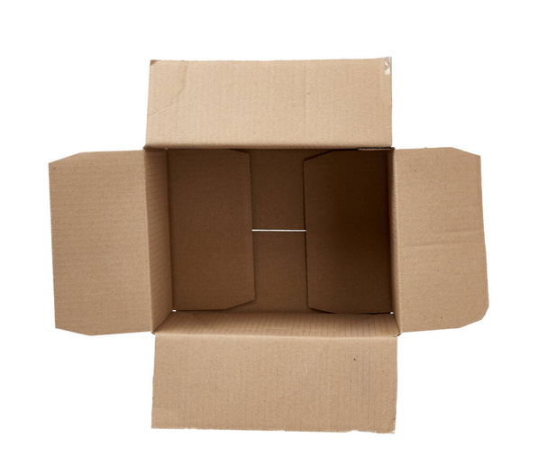 caja abierta rectangular vacía de papel de cartón marrón aislado sobre fondo blanco, vista superior
 - Foto, imagen