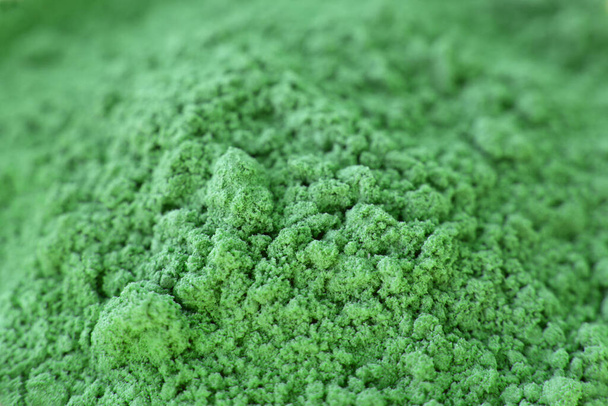 matcha dry green powder on a pink background for making Japanese natural tea - Photo, Image