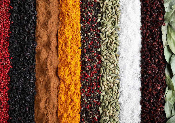 Many different spices as background, top view - Фото, зображення