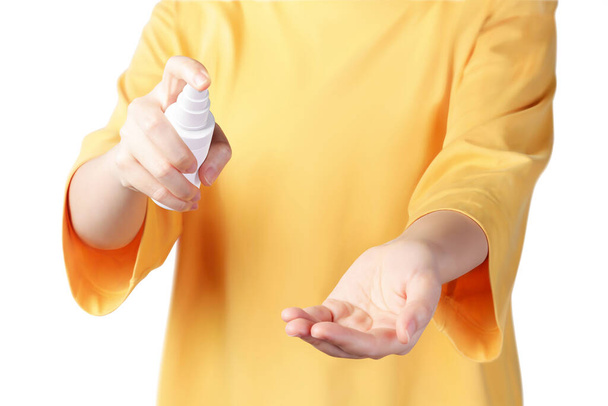 Young woman using hand sanitizer spray to clean her hands, concept of extra precautions to prevent infection, 3d illustration - Vettoriali, immagini