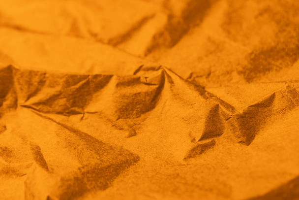 Buruşuk kahverengi bronz kaplama kağıt, desen soyut arkaplan - Fotoğraf, Görsel