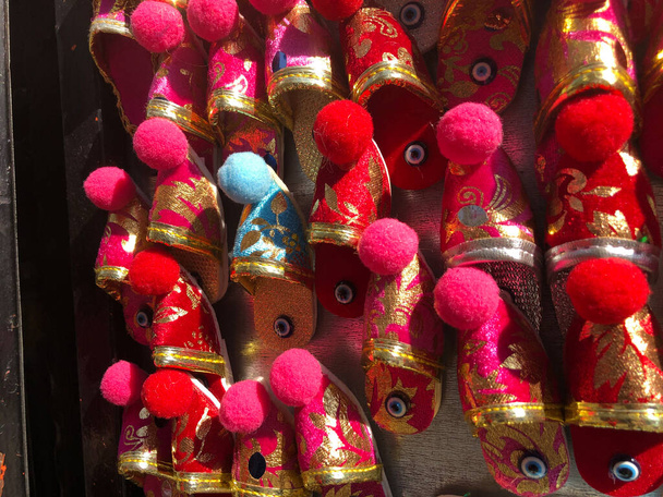 Colorful Turkish Slippers. Traditional Turkish Babouche Slippers for sale at Grand Bazaar in Istanbul, Turkey. - 写真・画像