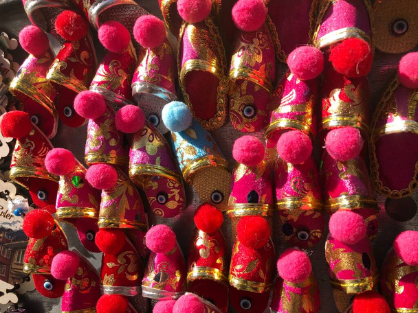 Colorful Turkish Slippers. Traditional Turkish Babouche Slippers for sale at Grand Bazaar in Istanbul, Turkey. - 写真・画像
