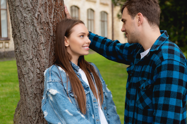 handsome student and attractive girl looking at each other  - Fotoğraf, Görsel