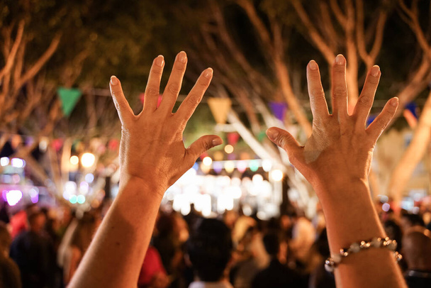 Party outdoor - hands up celebrating fest concert event - focused image - Youth,fest,event,music, and entertainment concept - Image - - Photo, Image