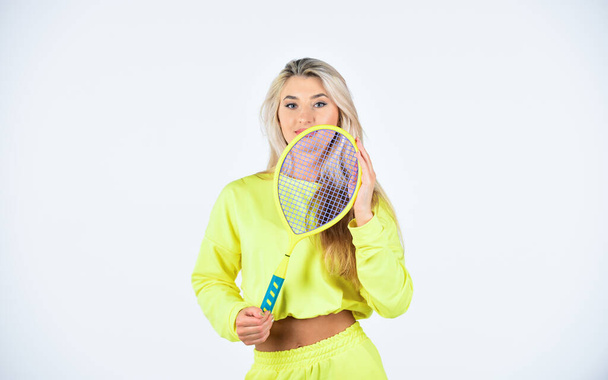 Satisfied with work out. professional tennis player. world tennis tour. full of success. sportswear and equipment. tennis player prepare to match. woman play tennis at court. focus on racket hit ball - Photo, Image