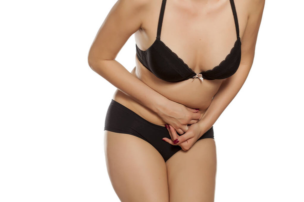 women in underwear has stomach pains - Photo, Image
