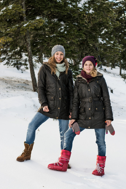 Two smiling friends in winter jackets countryside - Photo, Image