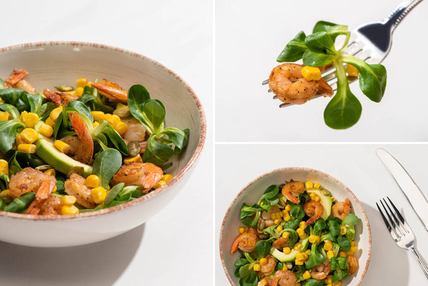 collage of fresh green salad with corn, shrimps and avocado on plate with cutlery on white background - Foto, afbeelding