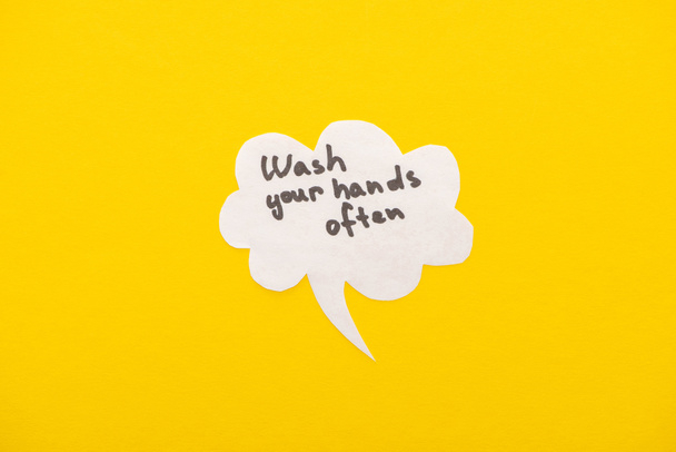 top view of speech bubbles with wash your hands lettering on yellow background - Photo, Image