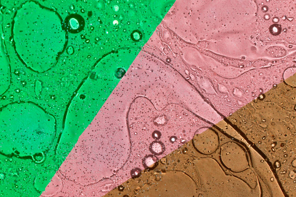 texture fuoriuscita di olio su sfondo color block rosa, marrone e verde
 - Foto, immagini