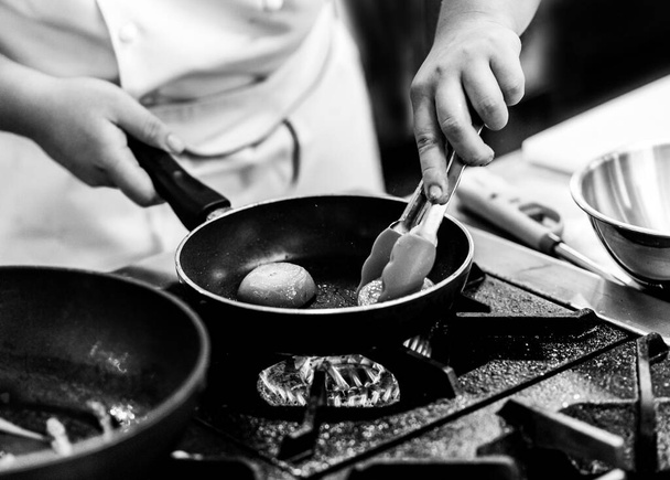 Chef cooking in a kitchen, chef at work, Black & Whit - Photo, Image