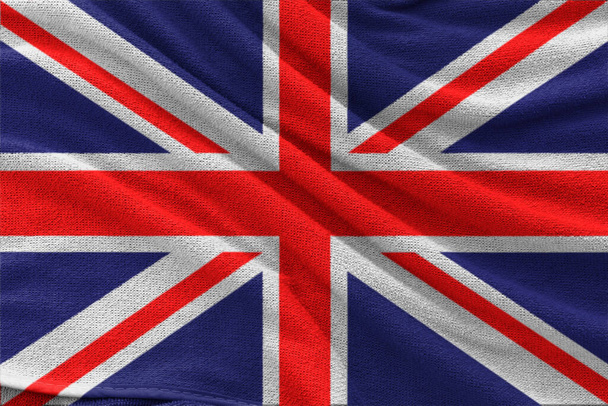 Birleşik Krallık bayrağının kumaş dalgalı dokusu. - Fotoğraf, Görsel