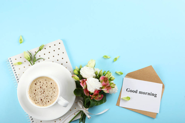 A cup of coffee, a bouquet of flowers and a card with the words "good morning". flatlay - Photo, Image