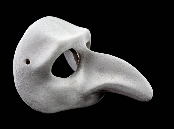 White plague doctor mask, on a black background. Epidemic concept. - Photo, Image