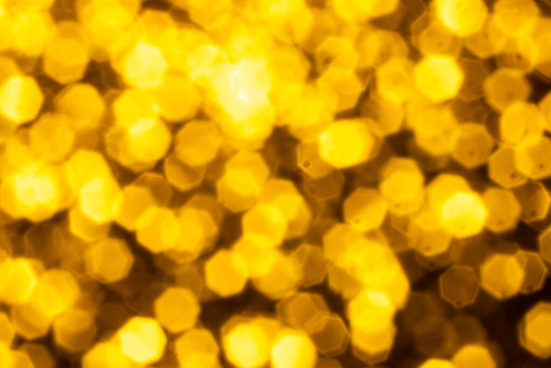 Golden glitter festive background with bokeh lights. Celebration concept for New Year, Christmas Holidays and happy valentine's day. - Zdjęcie, obraz