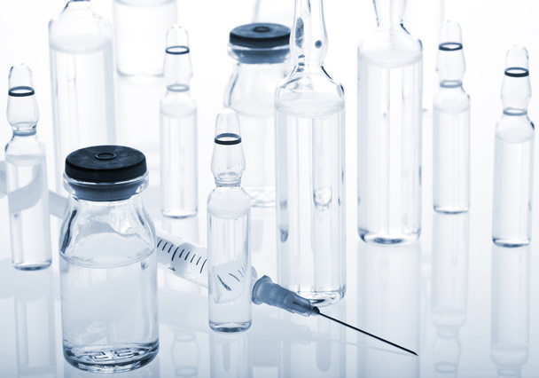 Glass Medicine Vials, Ampoules and Syringe - Valokuva, kuva