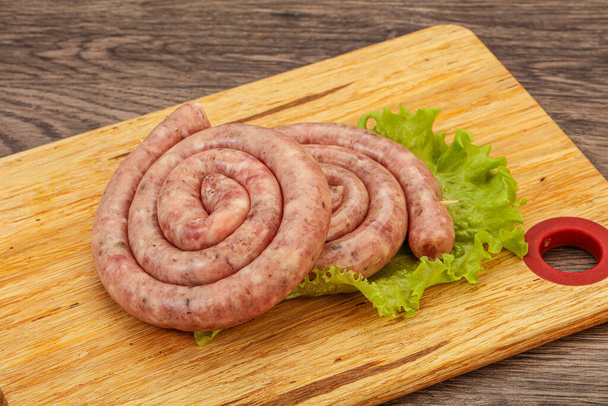 Raw pork sausage ring for grill - Photo, Image