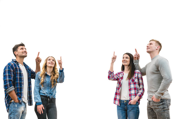 Четверо щасливих людей жестять на білому тлі
 - Фото, зображення