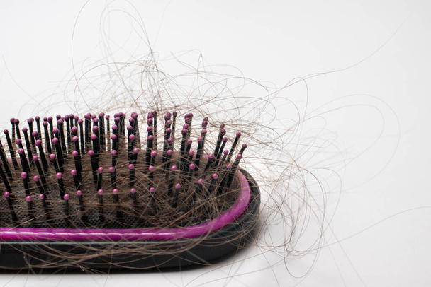 Comb, hair brush with fallen hair. Hair loss problem, baldness. Hair care. - Photo, Image