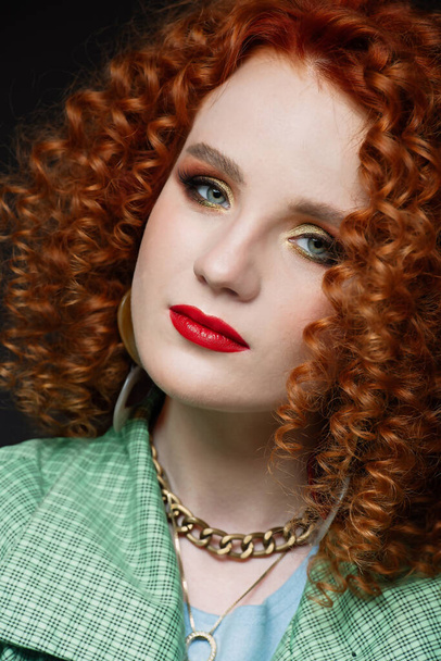 close-up portrait of a girl, curly red hair, red lipstick, calm look, white skin, puffy hairstyle, evening make-up, - Photo, Image