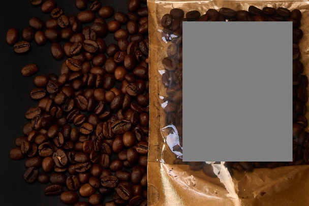 Packaging for coffee and coffee beans on a black background - Photo, Image