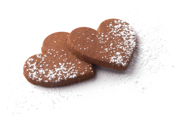 Пряникові серця печиво, ізольовані на білому тлі
. - Фото, зображення