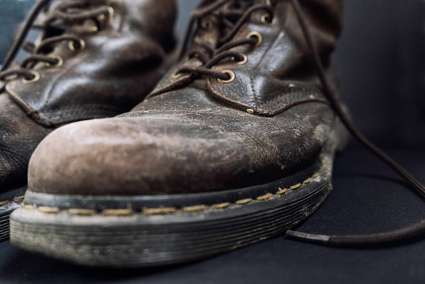 Old dirty brown shoes, close up, boots need to be cleaned - Photo, Image