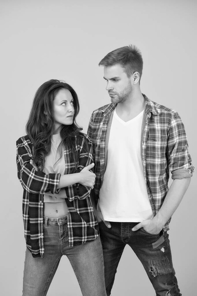 Fashionable outfit. Woman and man wear checkered shirt. sexy and stylish couple. happy valentines day. young family couple. students life is great. summer fashion collection. enjoying life and dating - Photo, Image
