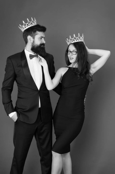 Success is our goal. Happy lovers celebrate success. Couple in love wear crowns red background. Enjoying success. Pride and pleasure. Successful and proud. Victory and triumph. Total success - Fotografie, Obrázek