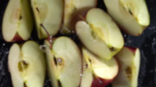Explosion of apples with water. Slow motion 250 fps - Footage, Video