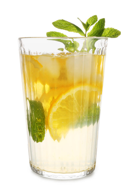 Glass of fresh lemonade on white background - Fotó, kép
