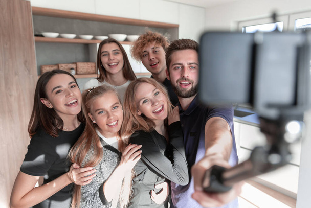 Image of happy young friends at home take a selfie by camera - Fotoğraf, Görsel