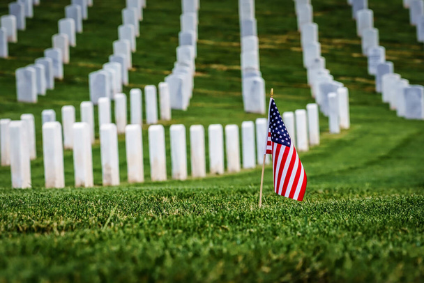 A flag on a grave at a southern California cemetery. - Photo, Image