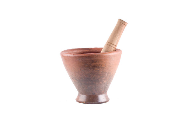 clay mortar and wood pestle on white background  cooking kitchenware object isolated - Photo, Image