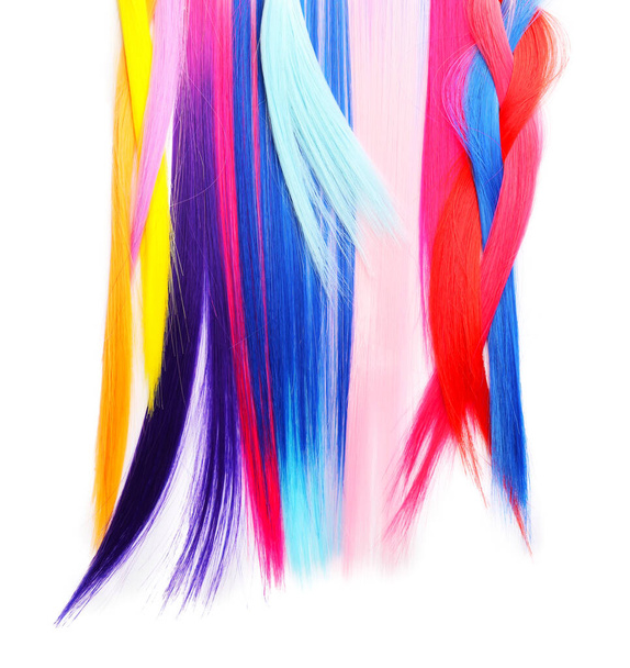 Hilos de pelo coloridos sobre fondo blanco
 - Foto, Imagen
