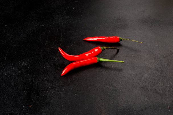 Red pepper shot on black background side view - Φωτογραφία, εικόνα