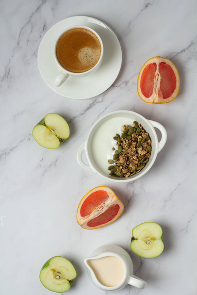 coffee, fruit, granola and milk top view - Photo, Image