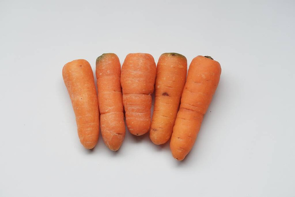 Baby carrot is a carrot sold at a smaller size before reaching maturity - Photo, Image
