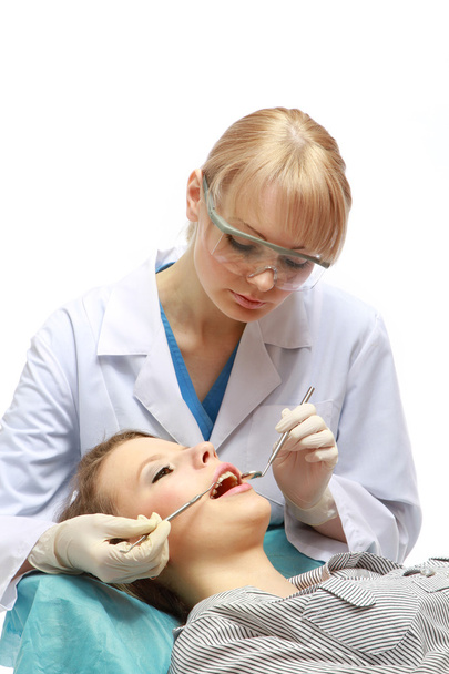 Examining patient's teeth - Foto, Bild