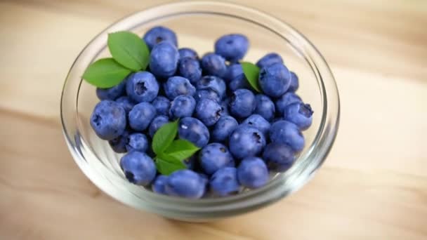 Blueberries lying in a glass plate - Materiaali, video