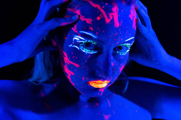 Image of girl with bright make-up in neon - Foto, imagen